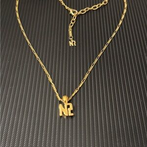 Nina Ricci Gold Necklace Elegant Minimalist Design